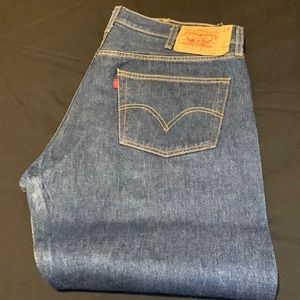 Mens lightly worn Levi’s 501 blue denim jeans